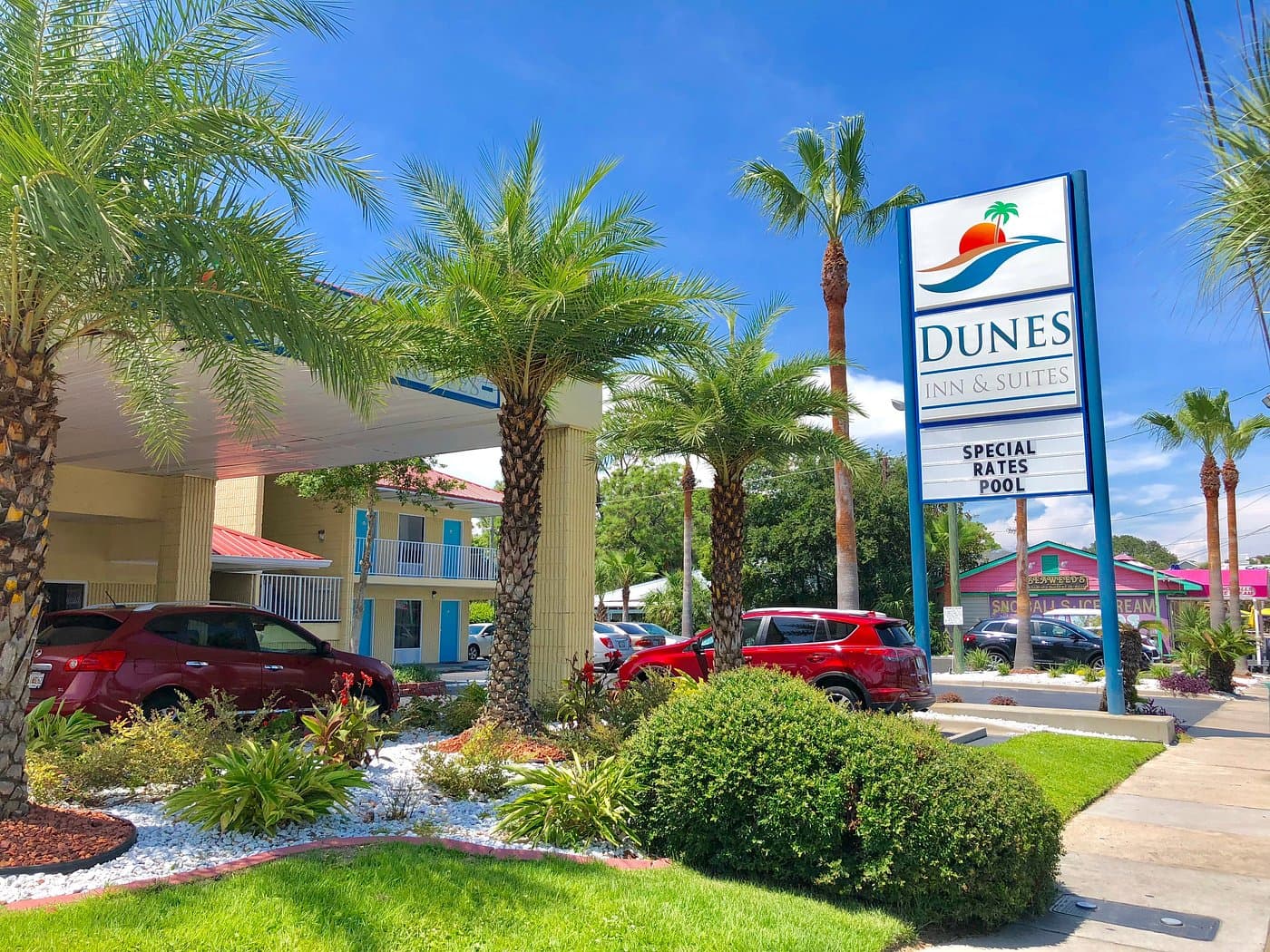 Dunes Inn & Suites exterior and sign on Butler Ave